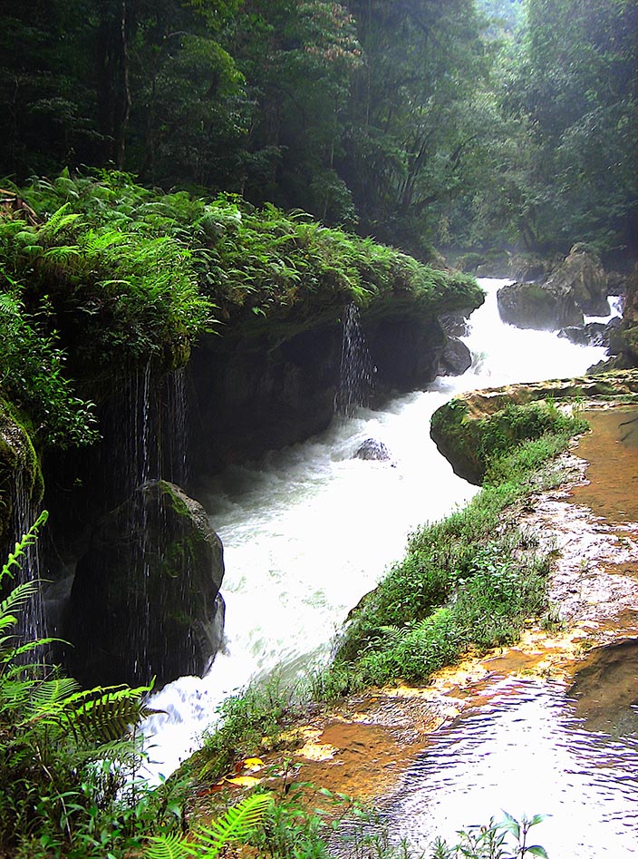 The rushing river through the limestone of Semuc Champey, Guatemala.