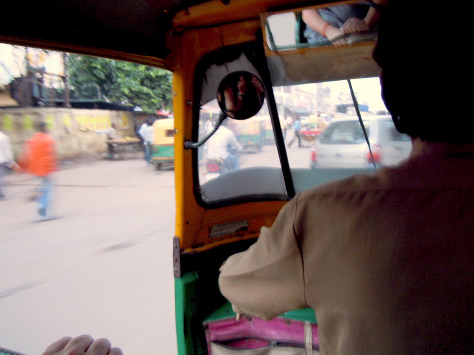 Racing through the streets of Agra aboard a Tuk Tuk